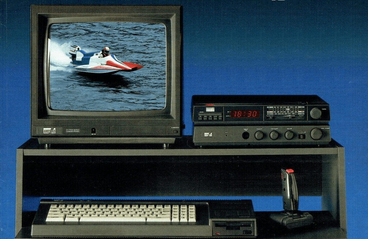 a french newspaper ad of an Amstrad CPC 6128 with station, disk drive, joystick, tv tuner and color monitor